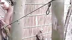 Indian amateur village girl outdoor shower - indianhiddencams.com