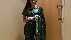 Pretty girl jasmine in sari strips to show us