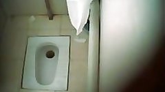 Indian babe filmed naked in public toilet - indianhiddencams.com